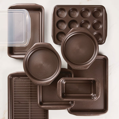 Different types of baking pans stacked on top of each other 