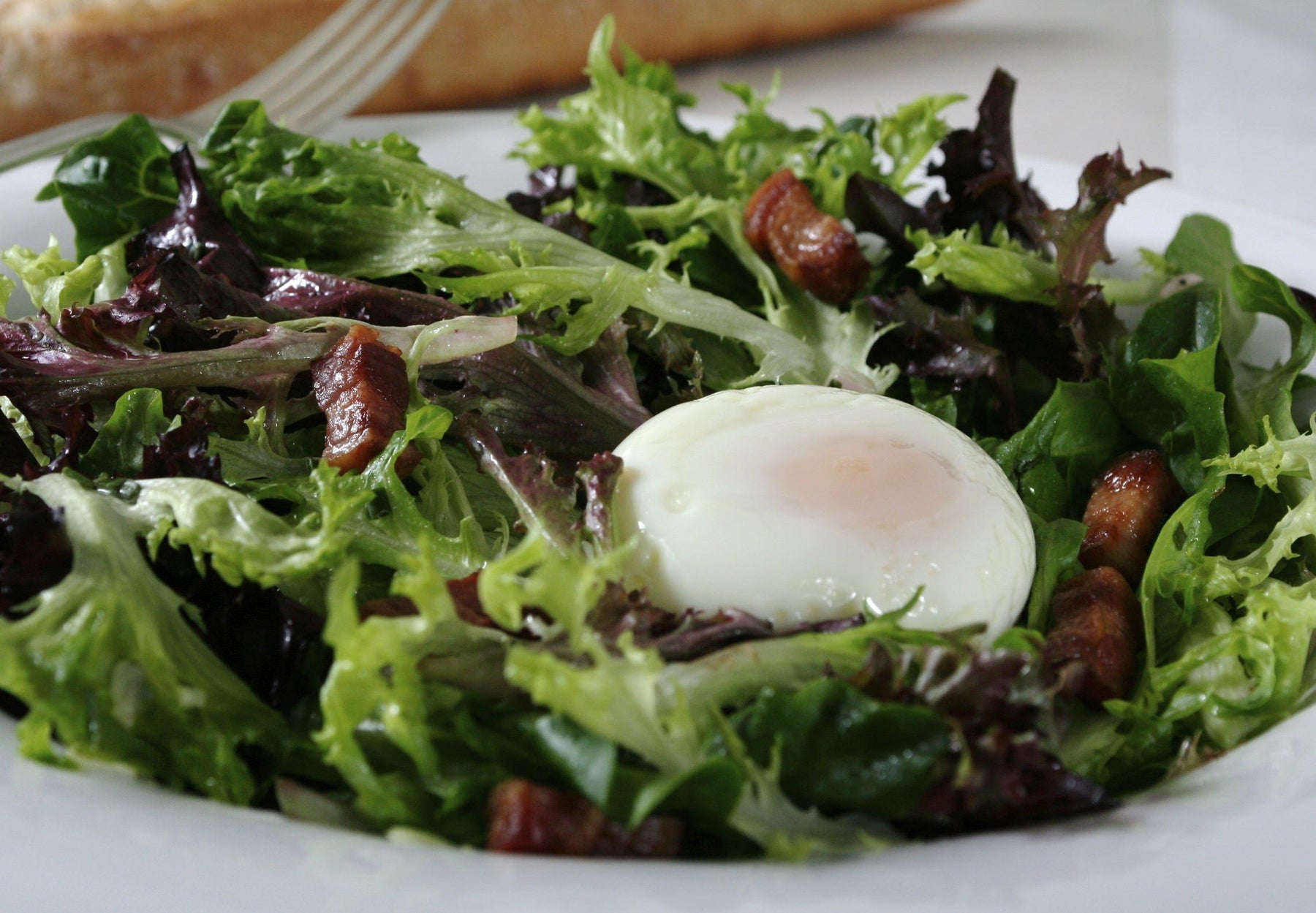 Bistro Salad with Poached Egg and Shallot-Chive Vinaigrette