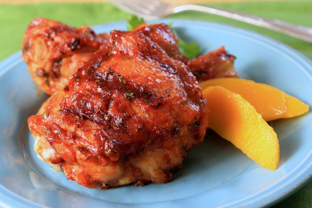 Grilled Chicken Thighs and Drumsticks with Sriracha-Mango Barbecue Sauce