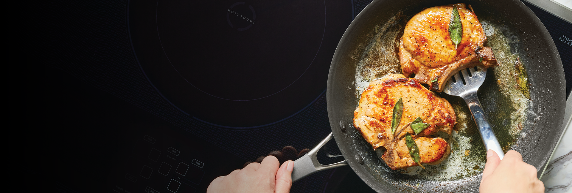 A person cooking food in a pan.