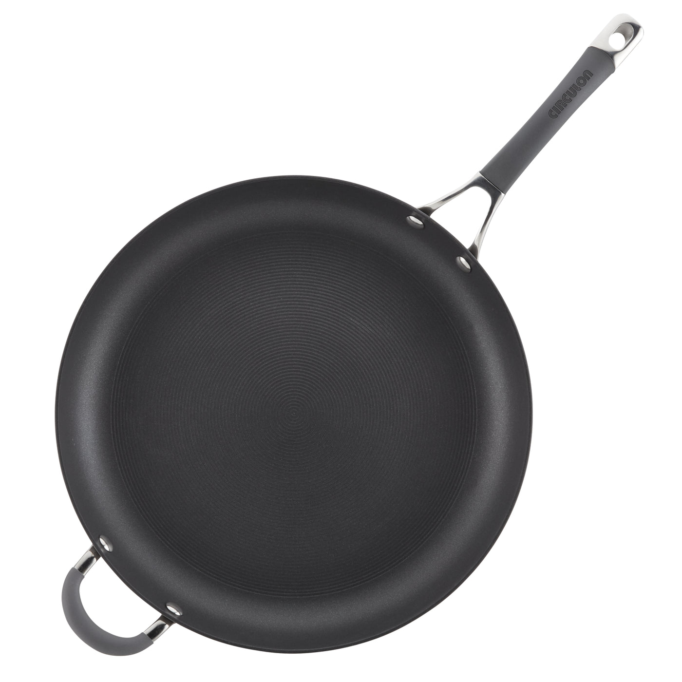 Black frying pan with a long handle and an additional loop handle.