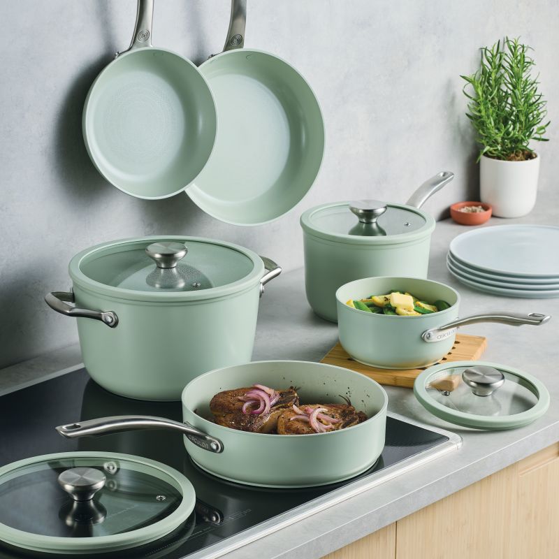 Ceramic Nonstick 10-Piece Cookware Set in mint green, shown with food and plates.