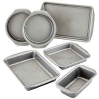 A set of five gray baking pans in various shapes and sizes.