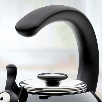 A black kettle handle with a stainless steel lid in close-up view.