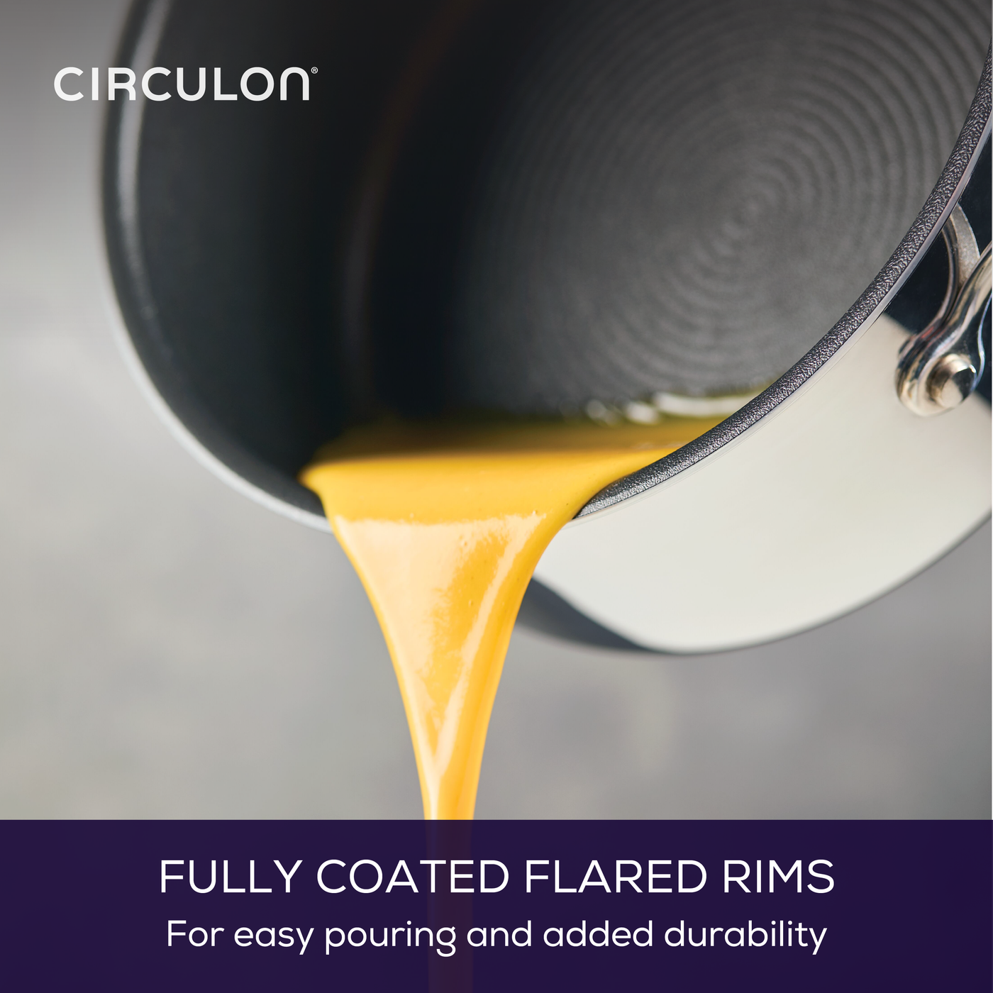 Sauce poured from a pan with flared rims and coated interior.