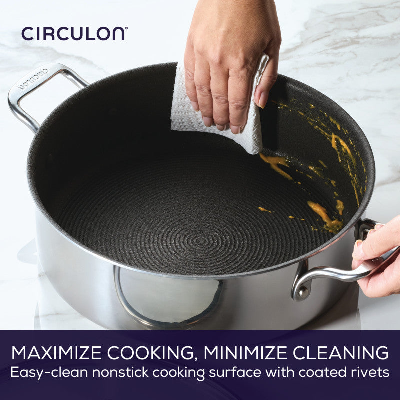Hand wiping the C1 Series 7-Quart Braiser leaves minimal residue on nonstick.