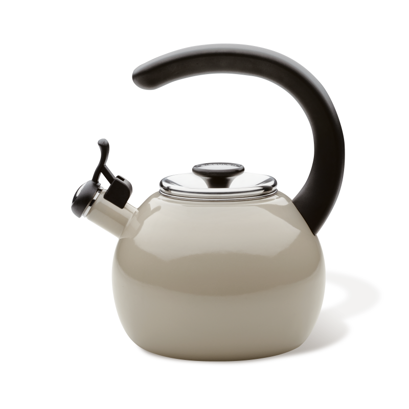 Side view of the gray whistling teakettle with a black arched handle, flip-up spout and stainless steel lid