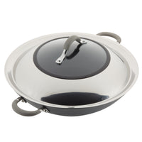 Stainless steel wok with a lid and gray handles.