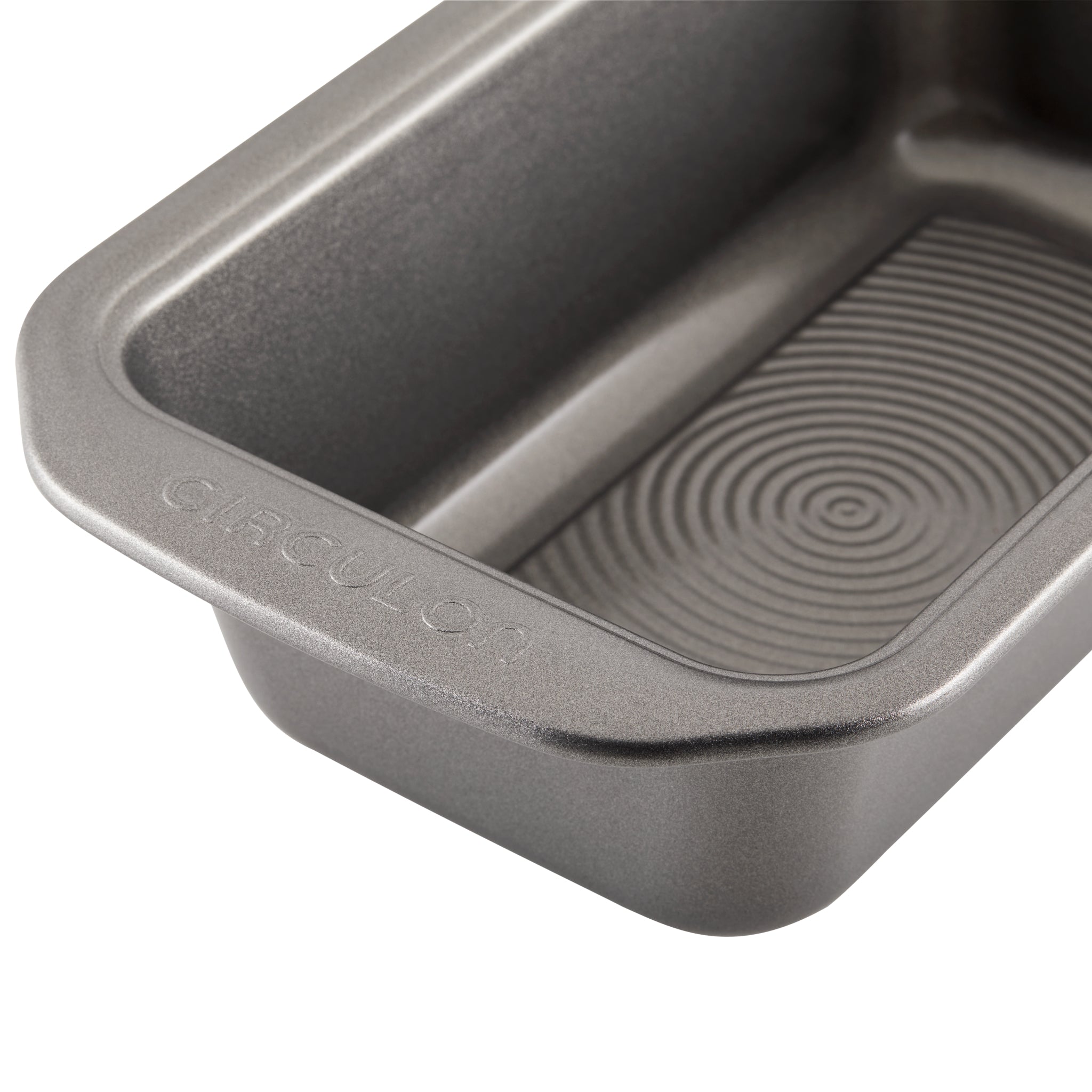 Close-up of an empty, rectangular non-stick baking pan with a textured surface.