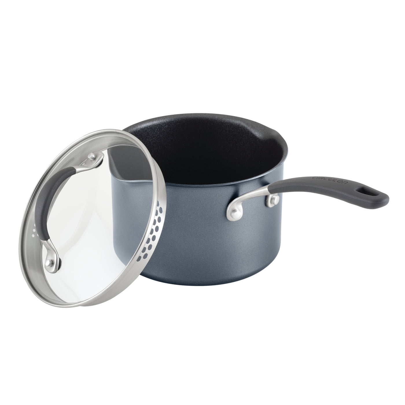 Non-stick saucepan with a black handle and a glass lid, slightly open.