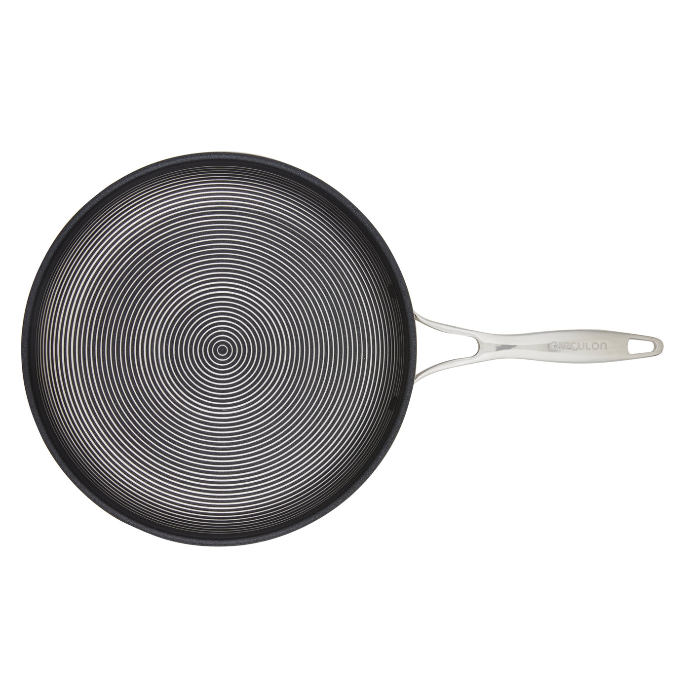 Non-stick frying pan with a spiraled cooking surface and metal handle.
