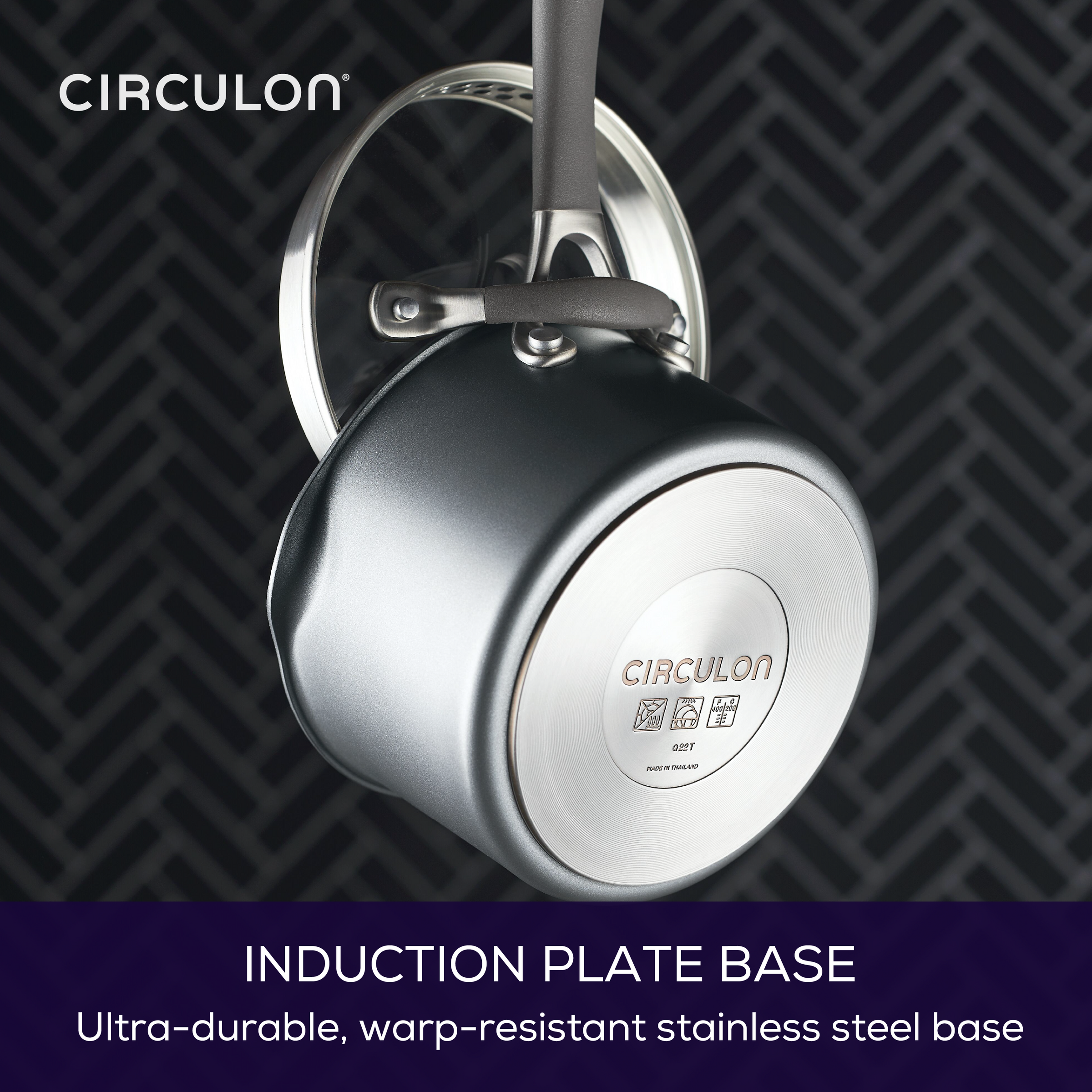 A 2-Quart A1 Sauce Pan hangs, showcasing its ScratchDefense™ induction base.
