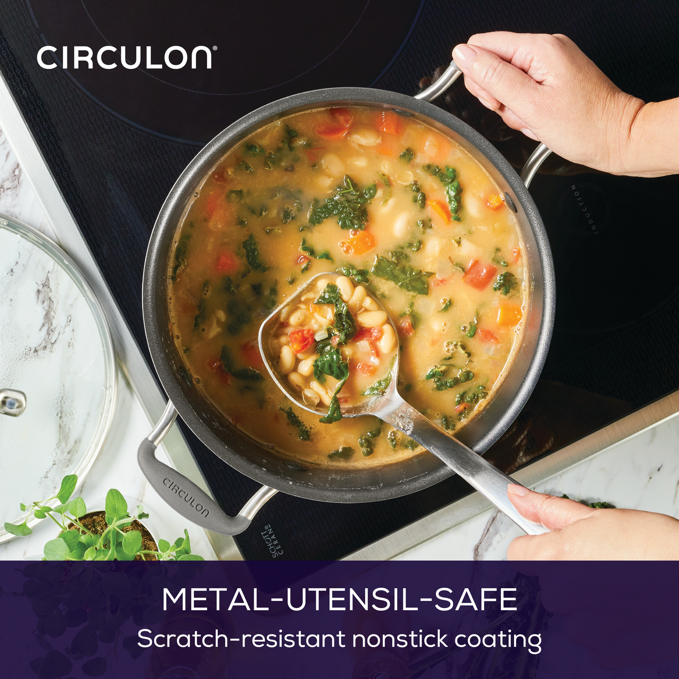 Hands holding a pot of vegetable soup on a stove with a ladle.