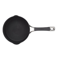 Black nonstick frying pan with a stainless steel handle viewed from above.