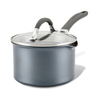 Blue saucepan with a lid and a black handle on a white background.