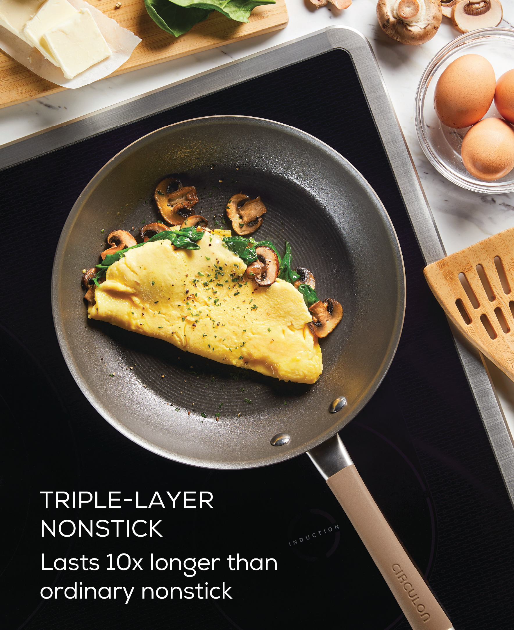 Omelet with spinach in a nonstick pan from the 5-Piece Cookware Set on the stove.