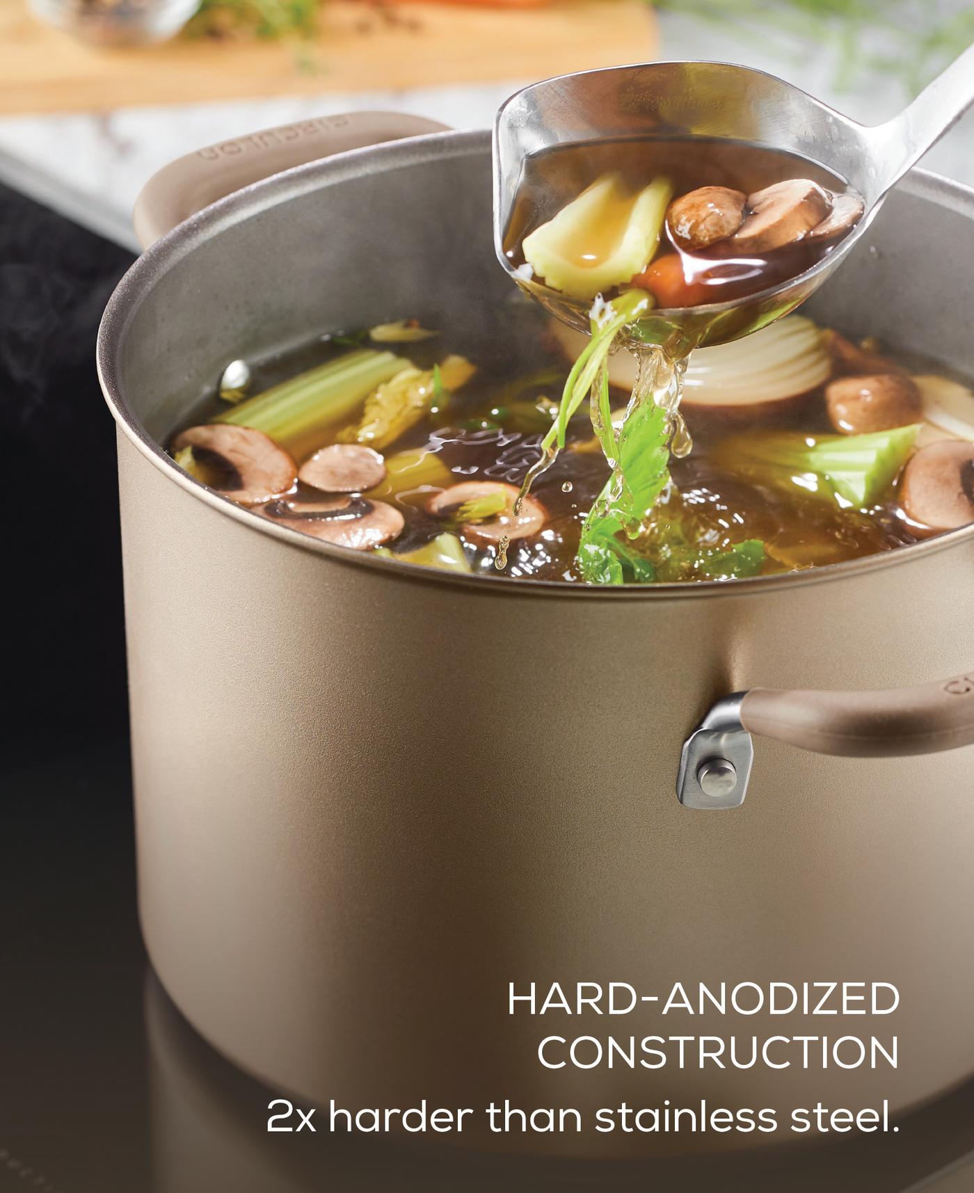 Soup with vegetables in a durable pot from the 5-Piece Nonstick Cookware Set.