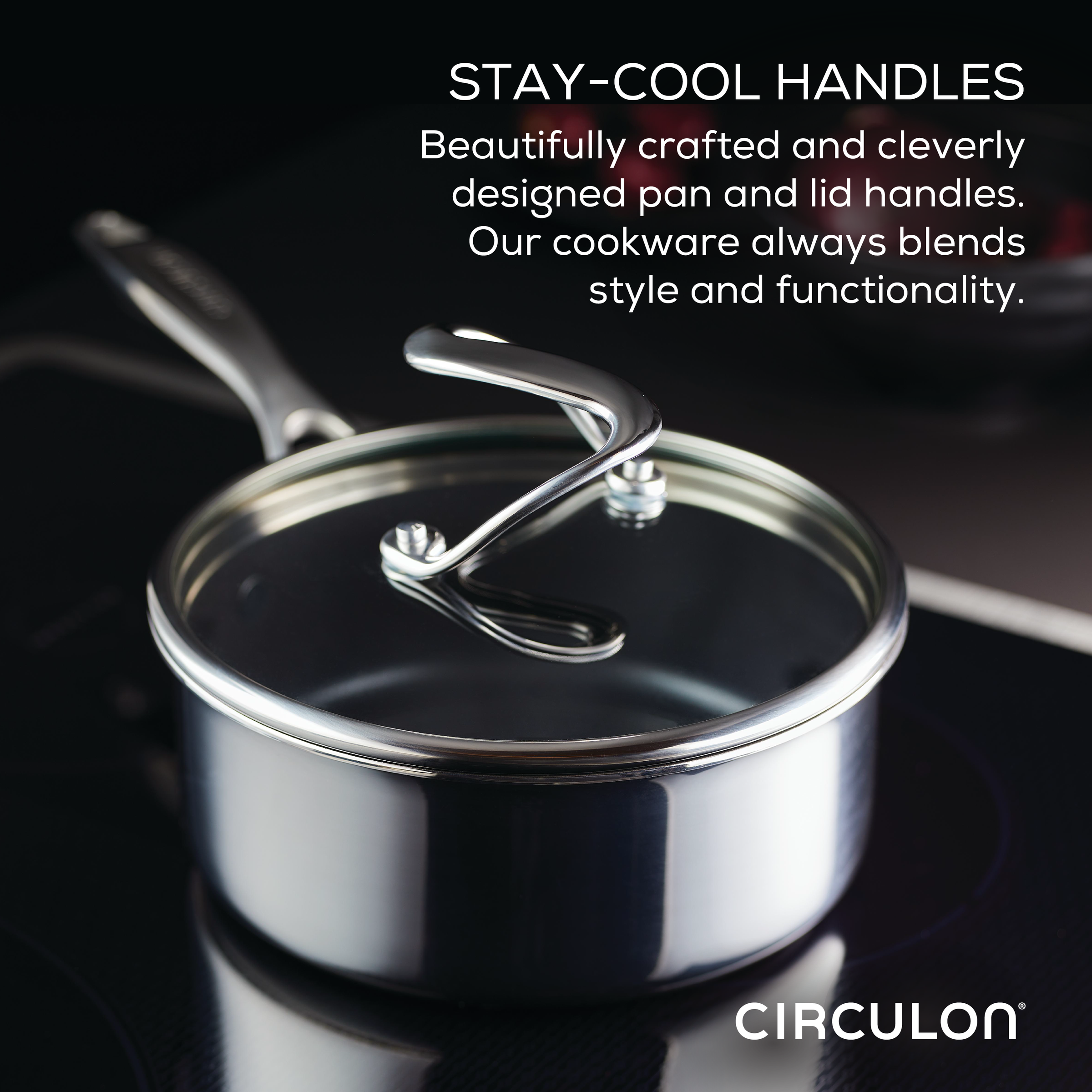 A stainless steel saucepan with a glass lid on an induction cooktop.