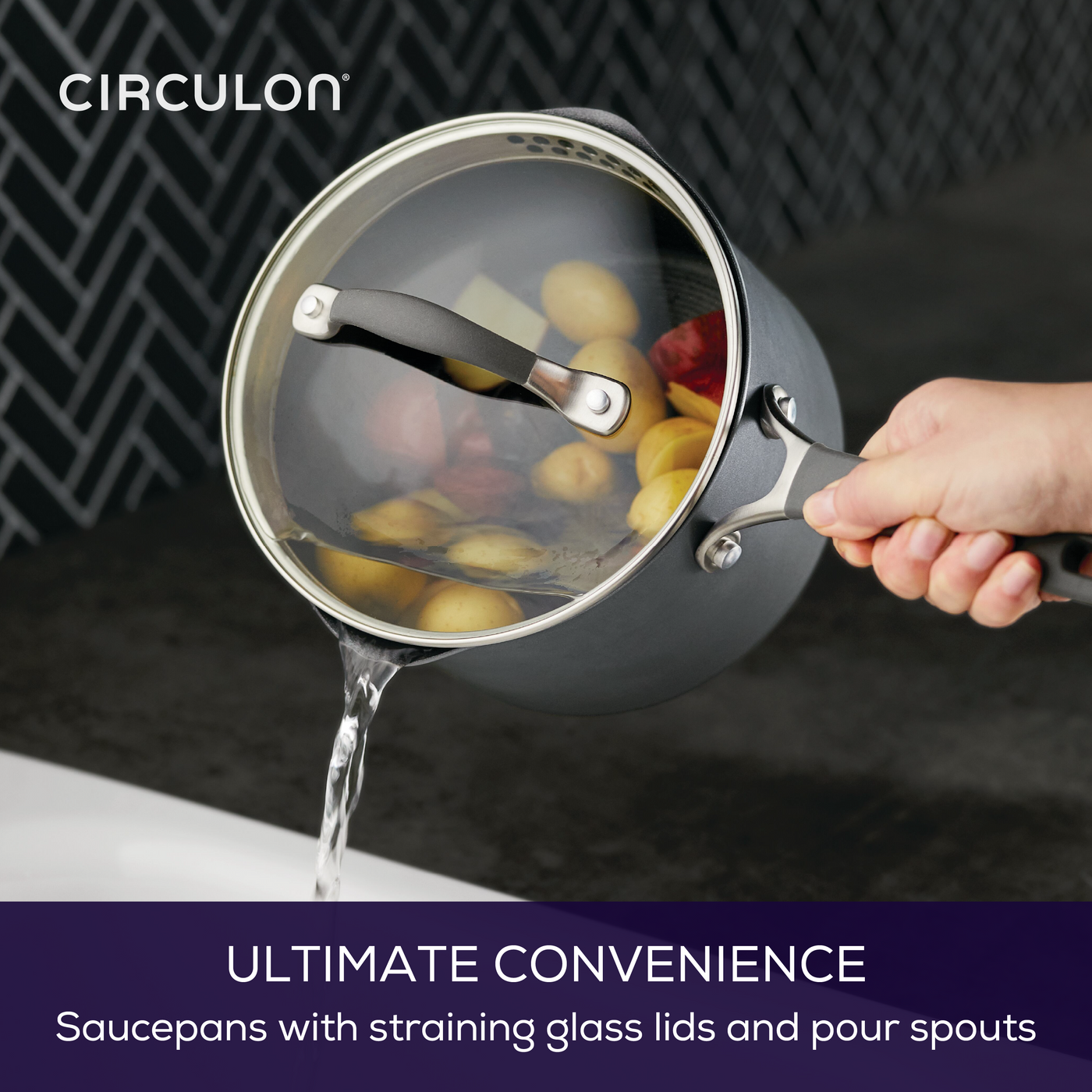 Person uses A1 ScratchDefense™ saucepan to pour water with straining lid.