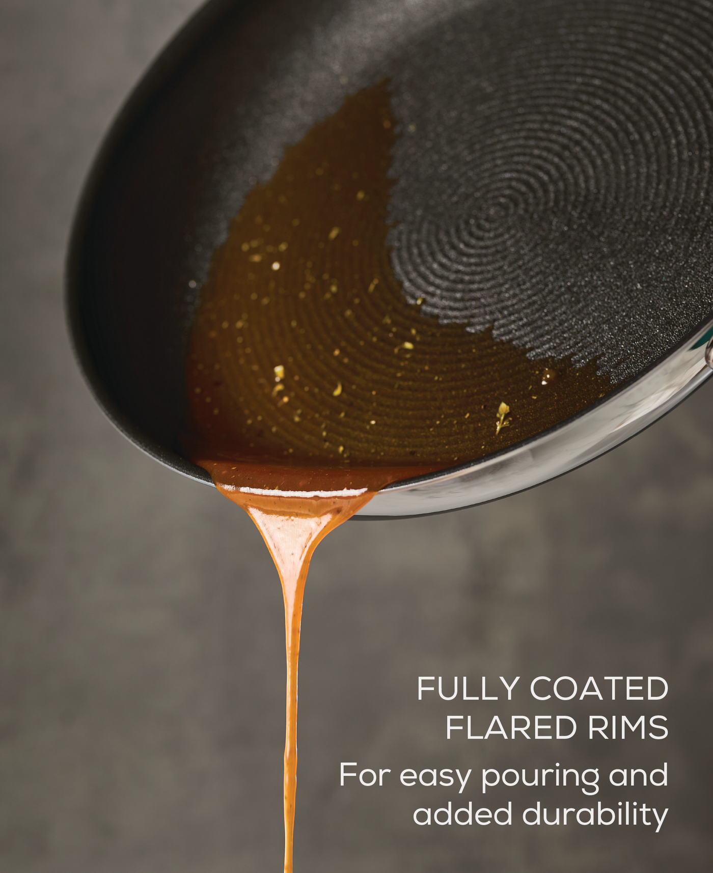 Pan with brown sauce being poured, text reads "FULLY COATED FLARED RIMS.