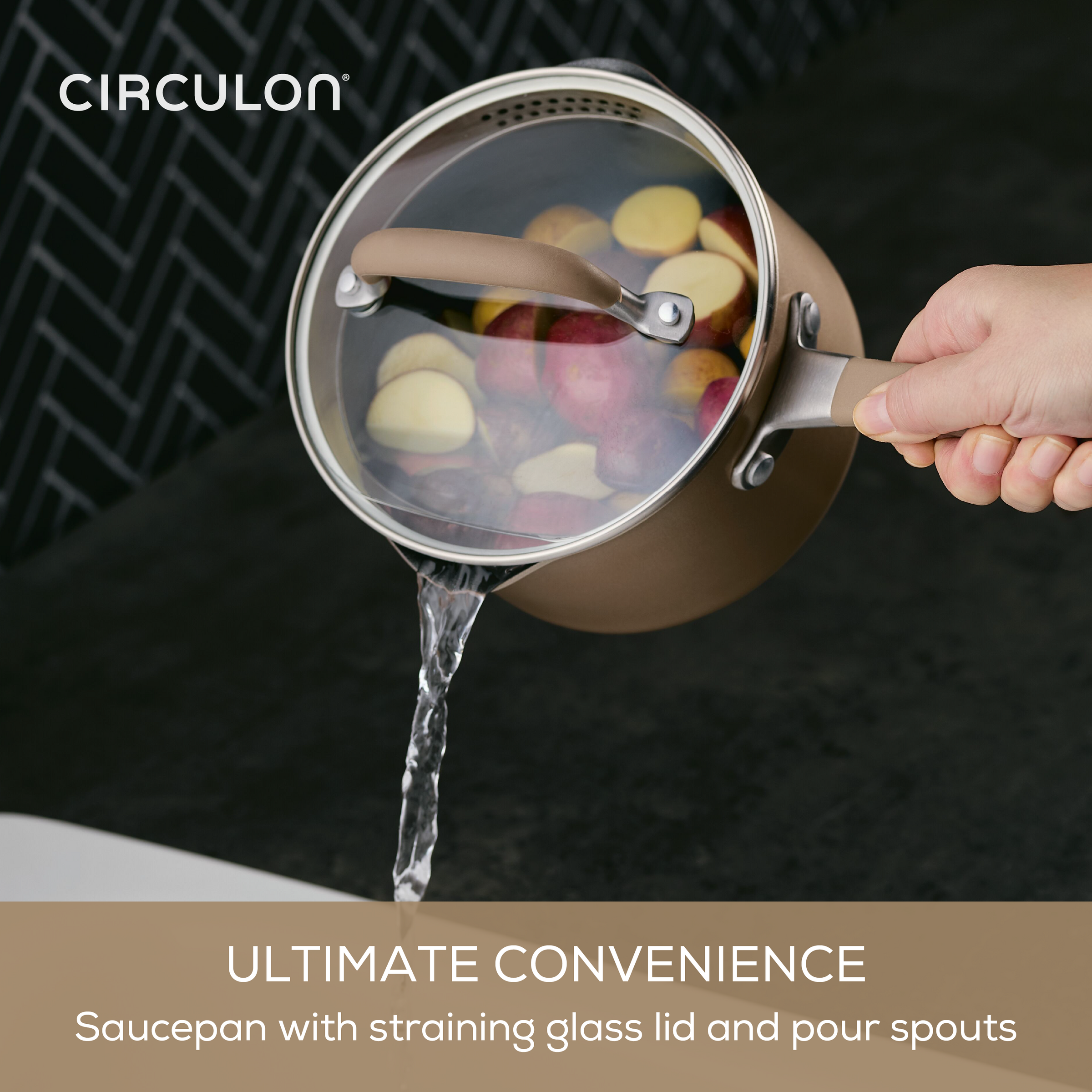 Hand pouring water using a Circulon 13-Piece ScratchDefense lid.