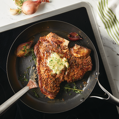 Impact-bonded steel base delivers unrivaled heat distribution, is induction ready &amp; oven safe to 500ºF.