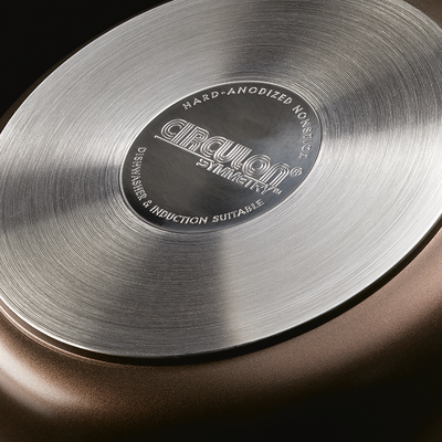 Close-up of a Circulon pan bottom with non-stick, dishwasher-safe label.