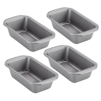 A set of four 9-by-5-inch loaf pans crafted from heavy-gauge steel arranged in a grid, designed with a dependable nonstick system for effortless baking.
