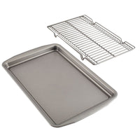 The 3-Piece Nonstick Bakeware Set, featuring a robust steel baking sheet and matching wire cooling rack, is showcased on a pristine white background.
