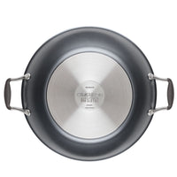 Nonstick frying pan with stainless steel bottom and two side handles.