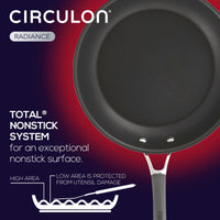 This sleek hard-anodized black nonstick frying pan is part of the 2-Piece Nonstick Frying Pan Set, set against a striking red and black gradient background.