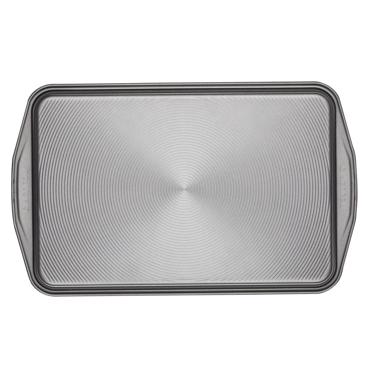 Nonstick Bakeware Set featuring a rectangular baking sheet with an advanced nonstick system, ridged pattern, and convenient handles for easy maneuvering.