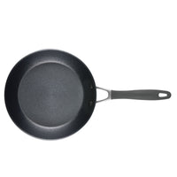 Non-stick frying pan with a black handle and circular cooking surface.