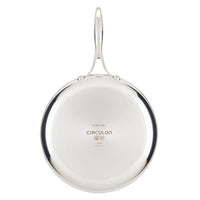 Stainless steel frying pan with a handle, seen from above.