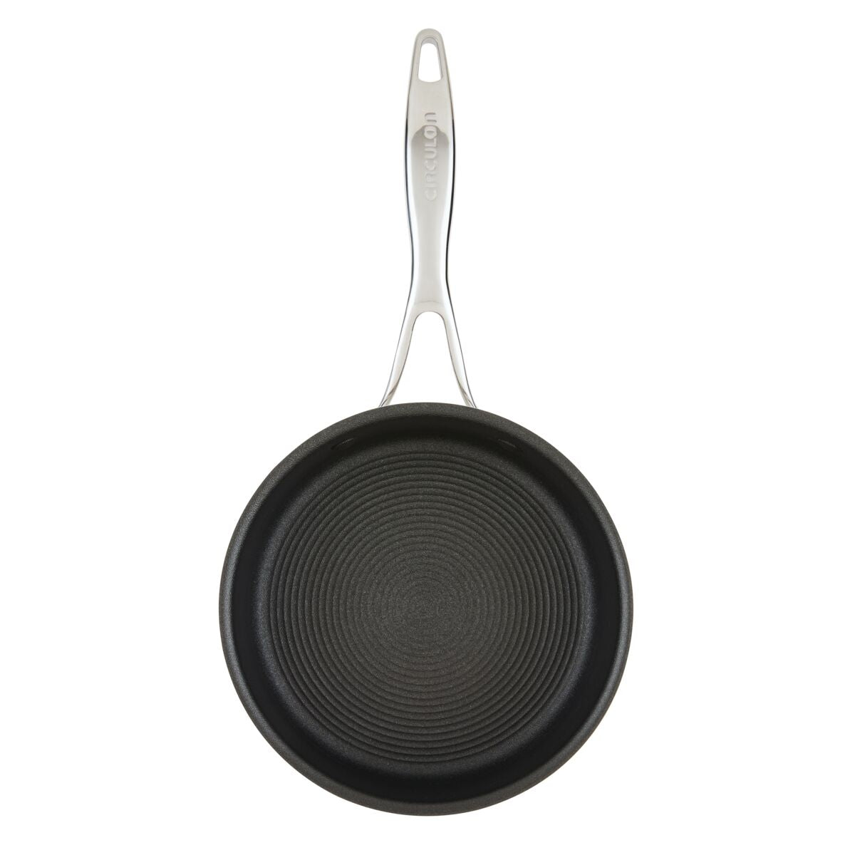 Nonstick frying pan with a ribbed surface and a metal handle.