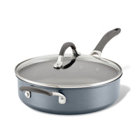 A gray cooking pan with a glass lid and black handle on a white background.