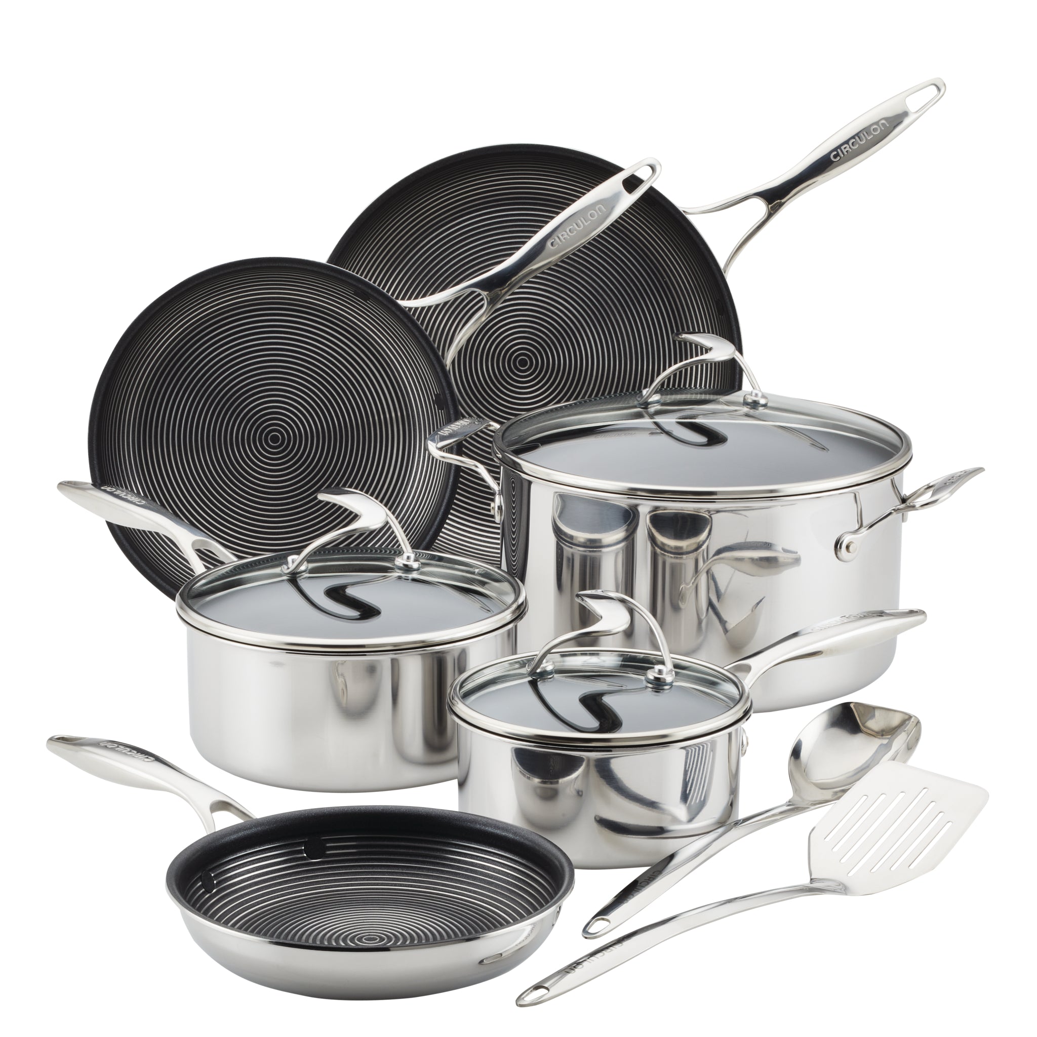 Set of stainless steel cookware with lids and utensils.