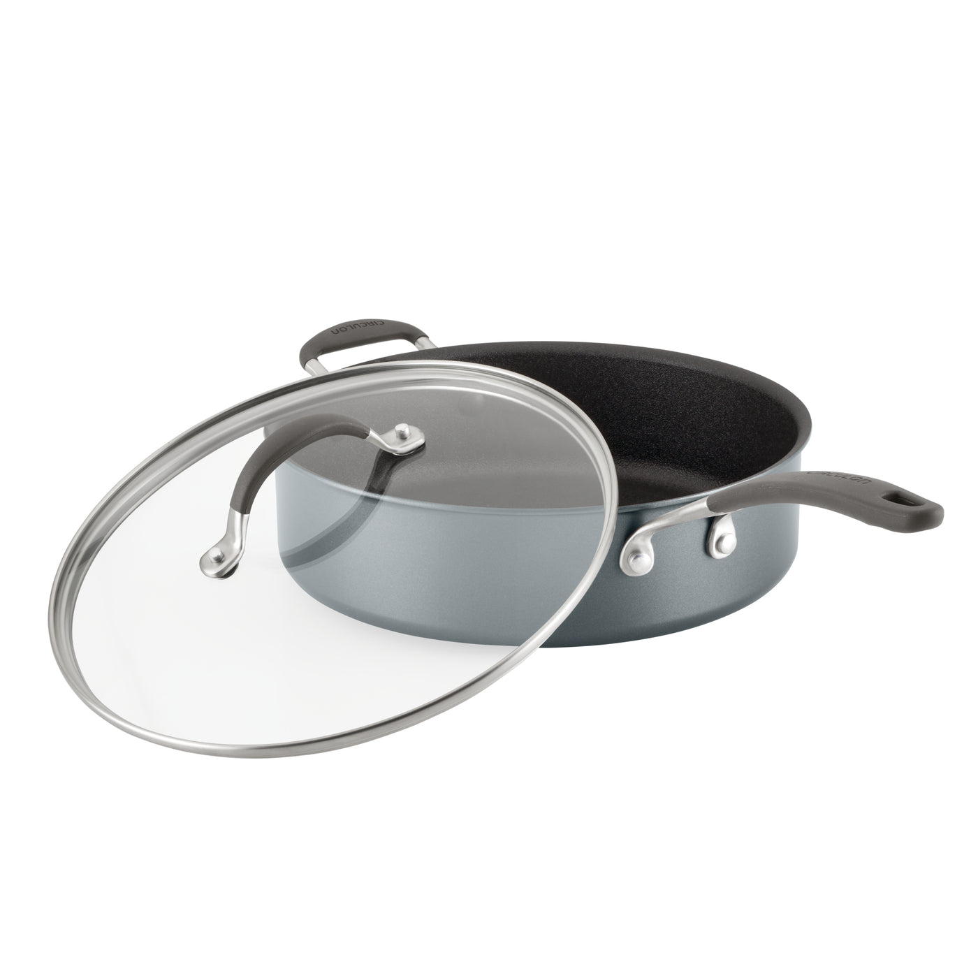 Nonstick frying pan with a glass lid, partially open.