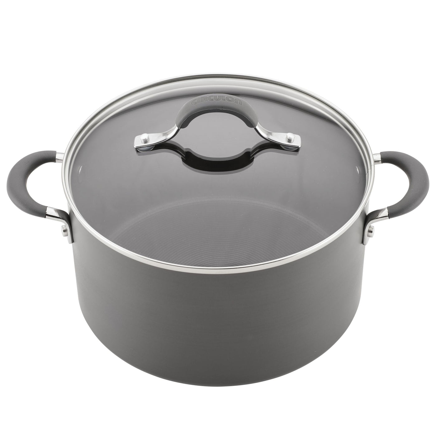 A black cooking pot with a glass lid and two handles.