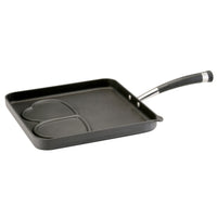 Square griddle pan with heart-shaped sections and a black handle.
