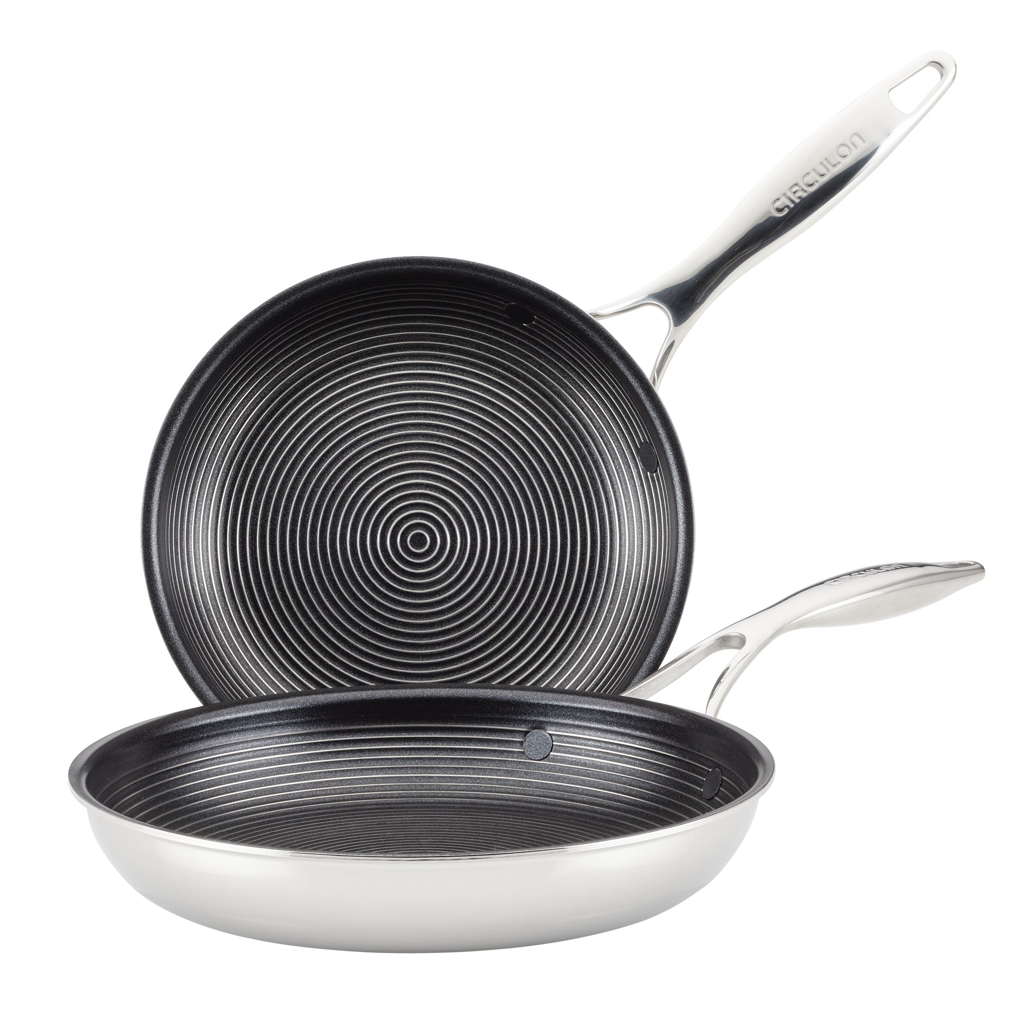 Two stainless steel frying pans with grooved non-stick surfaces.