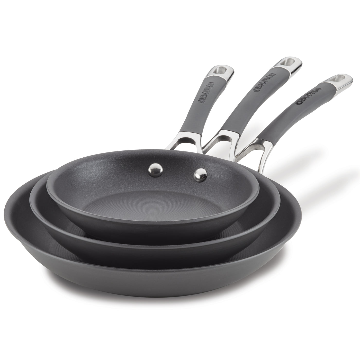 The 3-Piece Nonstick Frying Pan Set includes three nested gray frying pans, featuring silver and black handles, crafted from hard-anodized cookware for effortless cooking. They are dishwasher safe for easy cleanup.
