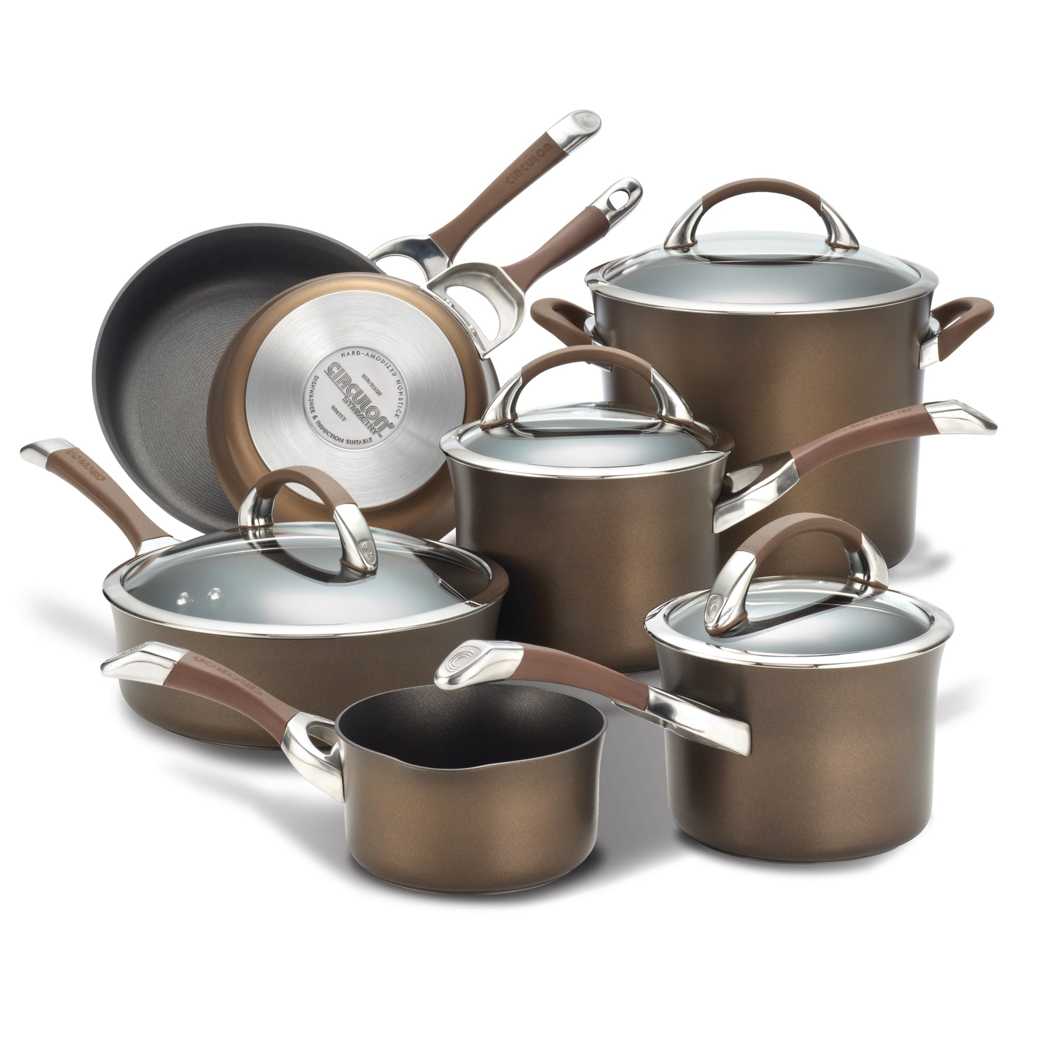 Set of brown pots and pans with glass lids and silver handles.
