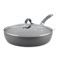 12-Inch Nonstick Deep Frying Pan in gray with a glass lid and rubberized handle, showcasing an advanced nonstick system, isolated on white.
