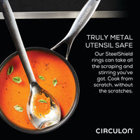 A 5 Quart Tri-Ply Clad Nonstick Saute with Lid & Helper Handle, filled with tomato soup and accompanied by two stainless steel utensils, is showcased next to a Circulon slogan, emphasizing the groundbreaking SteelShield technology for an exceptional nonstick experience.