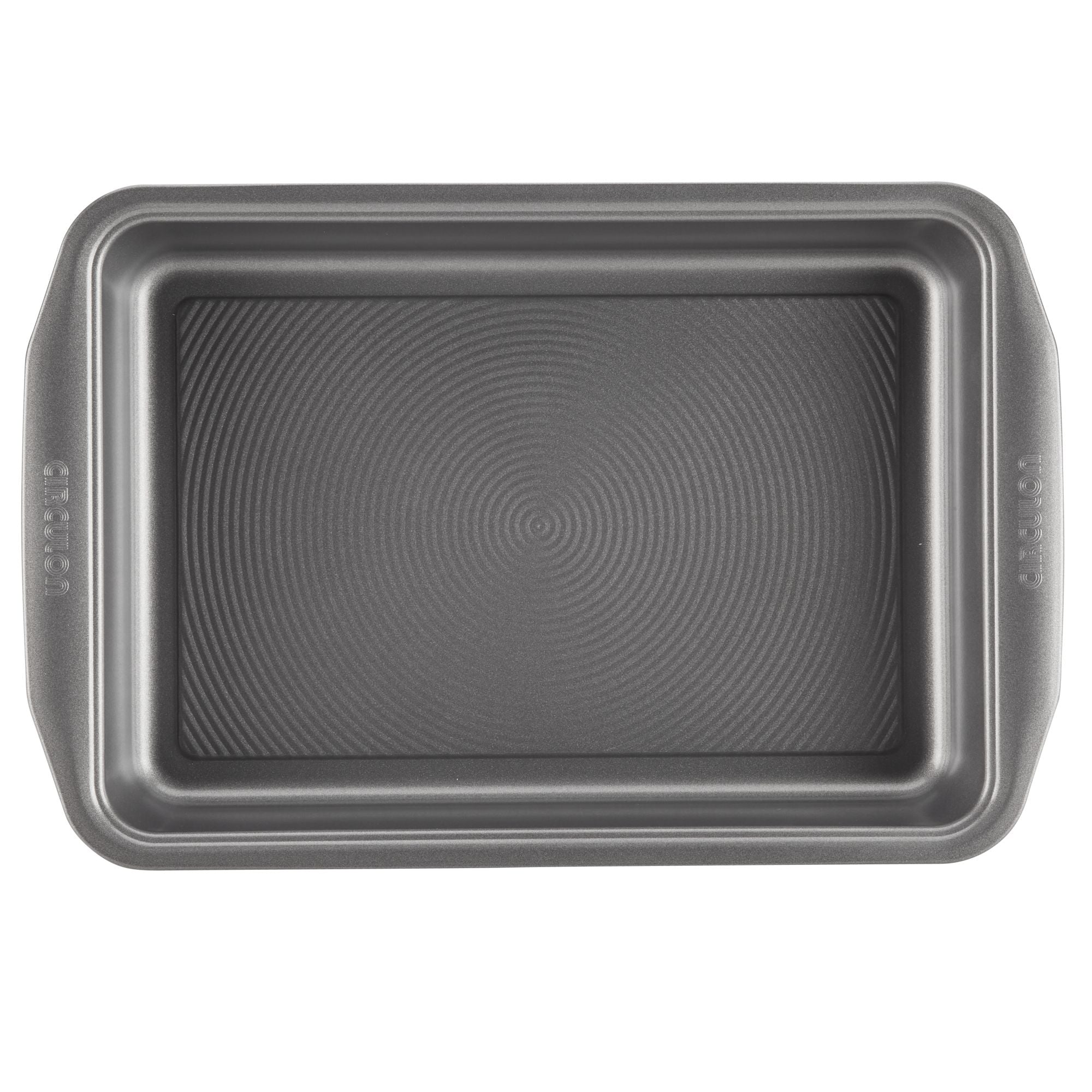 Viewed from above, the baking pan in the 5-Piece Nonstick Bakeware Set features a textured, nonstick surface for easy food release and is constructed from heavy-gauge steel to prevent warping, making it an essential addition to any kitchen.