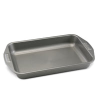 Nonstick Rectangular Cake Pan made with heavy-duty steel construction and designed with convenient handles, shown on a white background.