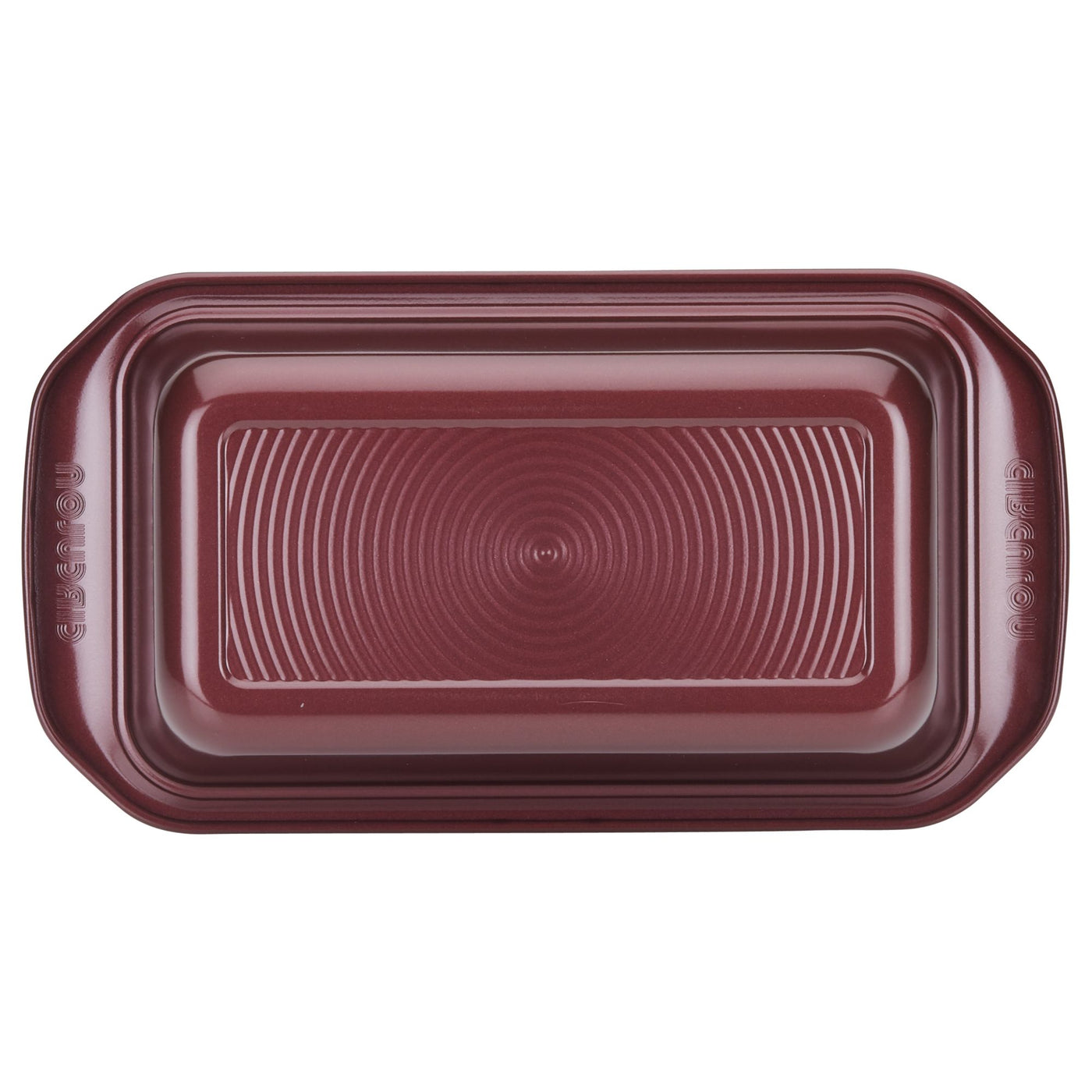 9" x 5" Nonstick Bakeware Loaf Pan crafted with premium quality, featuring a maroon finish and a circular pattern on the bottom.