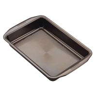 9" x 13" Nonstick Rectangular Cake Pan featuring a textured base, photographed from above.