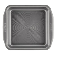 This square baking pan, part of the 5-Piece Nonstick Bakeware Set, is crafted from heavy gauge steel and includes a textured bottom along with side handles for easy grip. Its nonstick surface ensures effortless food release and provides warp resistance for long-lasting durability.